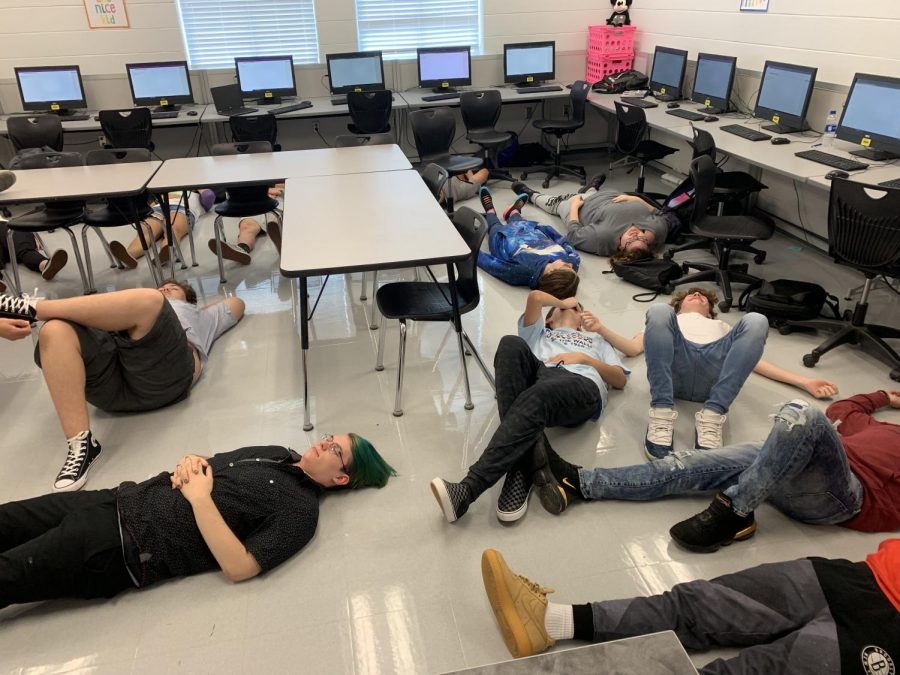 Students complete a relaxation exercise during the chapter on warming-up.