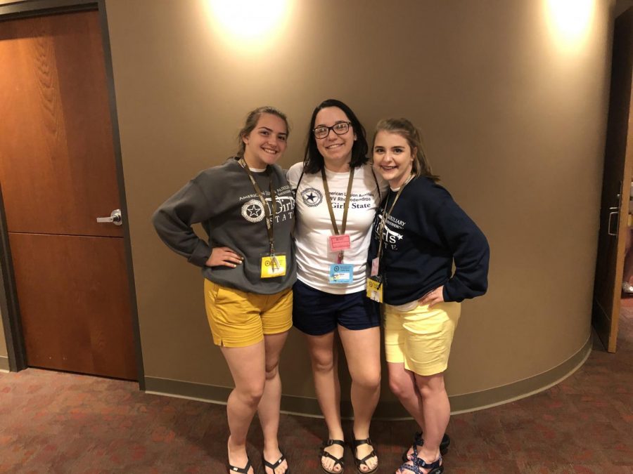 Summer Burkhammer, Jenna Barnhart and Jaden Hatcher pose for a picture during the last assembly of Girls State.