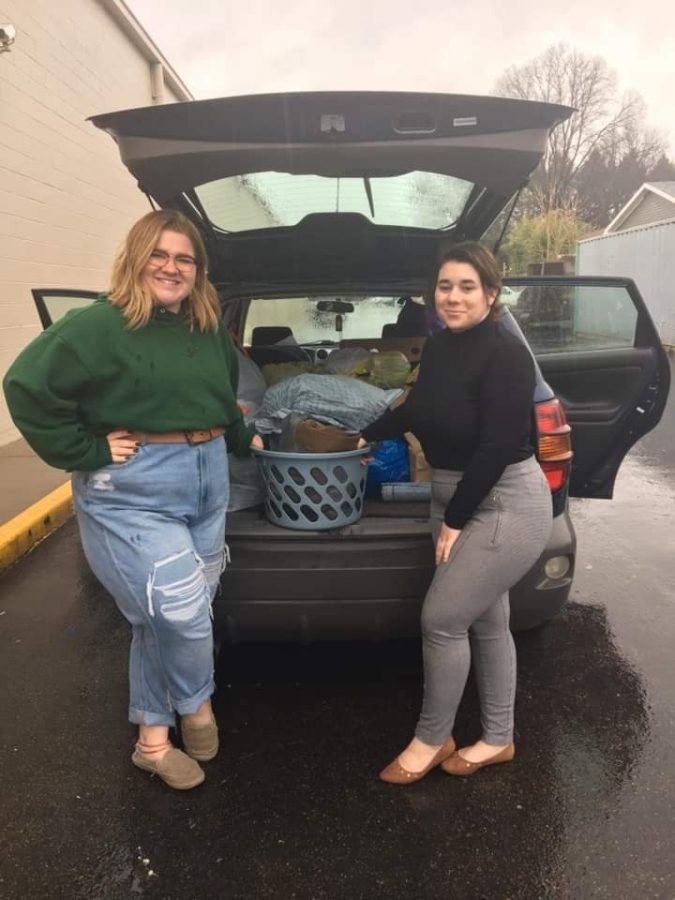 Aimee Chambers and Adriana Matson dropping off the jeans collected.